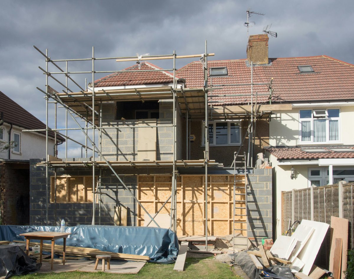 A single-family home under renovation, mid-construction